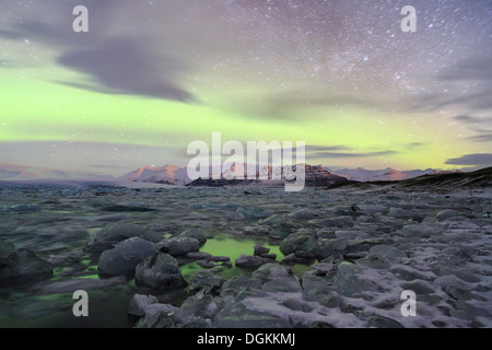 Aurora borealis over the Jokulsarlon Glacier Lagoon in Iceland. Stock Photo
