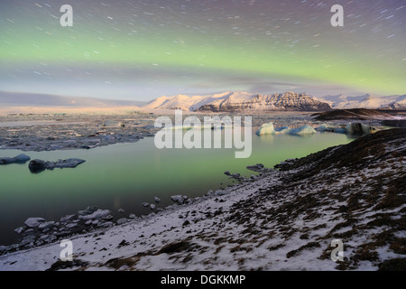 Aurora borealis over the Jokulsarlon Glacier Lagoon in Iceland. Stock Photo