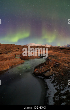 Aurora borealis over Lake Thingvallavatn in Thingvellir National Park in Iceland. Stock Photo