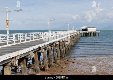 Old jetty at low tide, wooden construction, Picnic Bay, Magnetic Island, Queensland, Australia Stock Photo