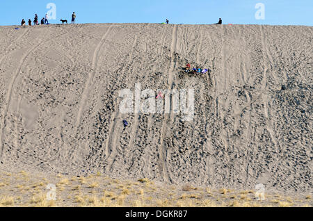 Fun activity on the Little Dune, Bruneau Dunes State Park, Bruneau, Idaho, USA Stock Photo