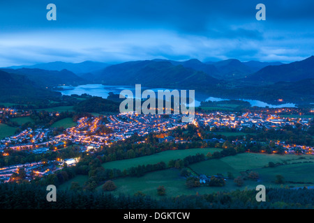 Night view over Keswick and Derwent Water from Latrigg summit towards Derwent Fells. Stock Photo