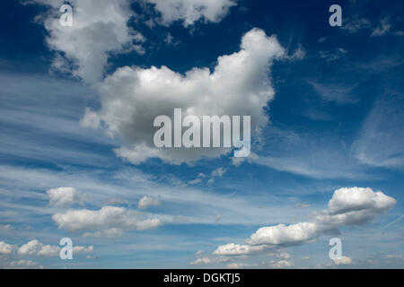 Cumulus clouds and cirrus clouds in the sky Stock Photo