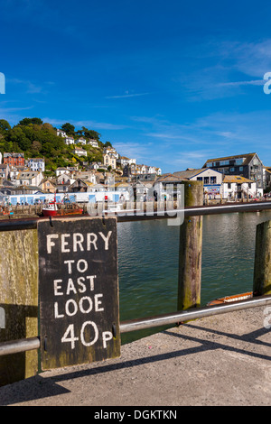 Ferry price board for pedestrian passengers across the River Looe. Stock Photo