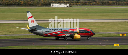 TUI slogan on aircraft 'train to the plane', Boeing 737-8K5 WL, aircraft with regional train design Rail & Fly action by Stock Photo