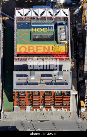 Aerial view, message 'Ganz hoch oben', German for 'very high up', on the roof of Katharinenschule primary school, daycare Stock Photo