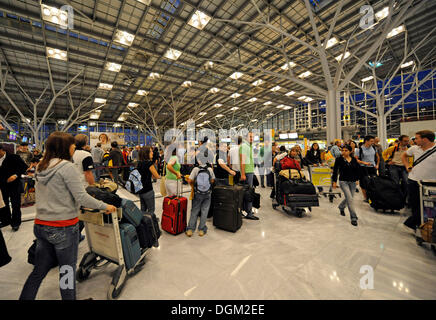 Passengers waiting in line at the check-in, Stuttgart Airport, Baden-Wuerttemberg Stock Photo
