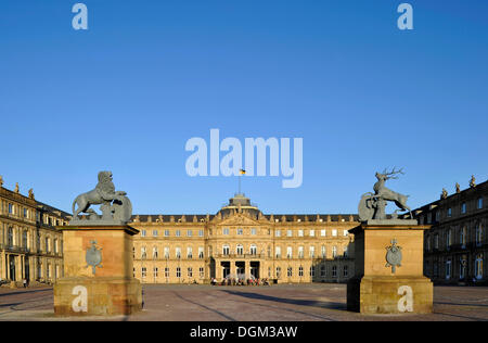 Heraldic animals lion and deer by Anton von ISOPIS at the main entrance and courtyard, Schlossplatz square, Neues Schloss castle Stock Photo