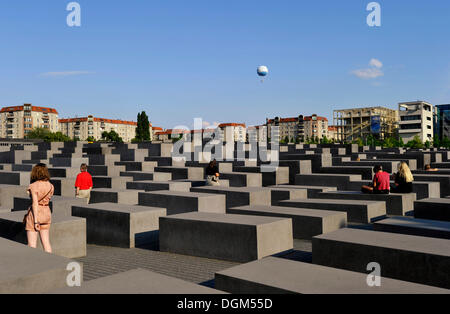 Visitors at the Holocaust Memorial designed by architect Peter Eisenman, Memorial to the Murdered Jews of Europe Stock Photo