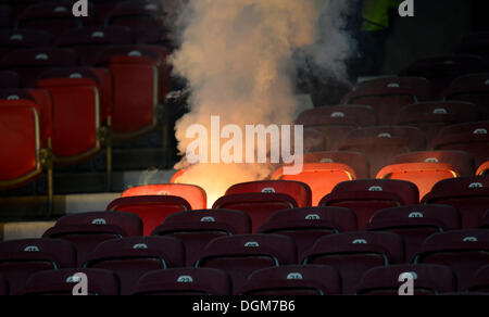 Row of seats going up in flames, flares, fireworks on the seats, fire, Mercedes-Benz Arena, Stuttgart, Baden-Württemberg Stock Photo