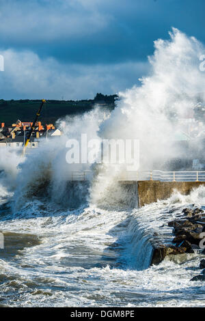 Aberystwyth Wales UK, Wednesday 23 October 2013 Gale force winds, a high tide and stormy seas bring huge waves crashing into the promenade at Aberystwyth on the west wales coast, UK. Stormy weather has swept across the UK with more on the way according to reports. Credit: keith morris/Alamy Live News Stock Photo