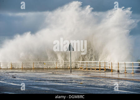 Aberystwyth Wales UK, Wednesday 23 October 2013 Gale force winds, a high tide and stormy seas bring huge waves crashing into the promenade at Aberystwyth on the west wales coast, UK. Stormy weather has swept across the UK with more on the way according to reports. Credit: keith morris/Alamy Live News Stock Photo