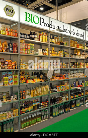 Shelf with various organic products at the Gruene Woche, 'Green Week' trade fair 2010 in Berlin Stock Photo