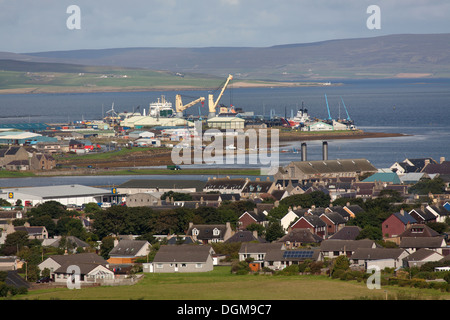 Islands of Orkney, Scotland. Elevated view over the Orkney town of Kirkwall with the Haston ferry terminal in the background. Stock Photo