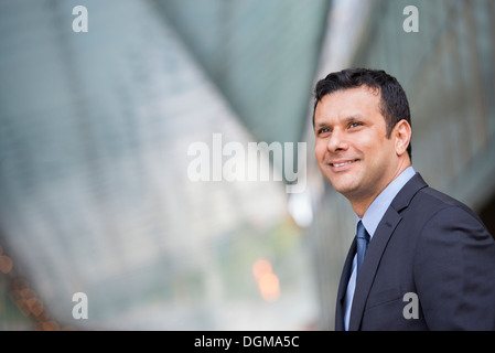 Business people. A latino businessman in business clothes. Stock Photo