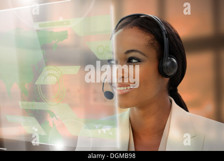 Pleased pretty businesswoman using futuristic interface hologram Stock Photo