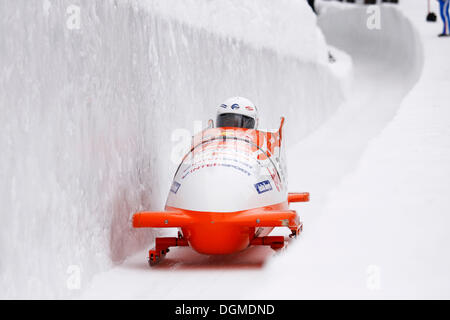 Two-man bobsled, natural ice rink, World Cup St. Moritz 2010, Engadin, Switzerland, Europe Stock Photo