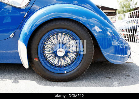 Rear wheel of a vintage car, Bugatti 57 SC Atlantic, built in 1937, iconic vehicle of automotive construction, only 4 examples Stock Photo