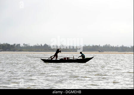 Fishing boat on the Thu Bon river, silhouette, Hoi An, Quang Nam, Central Vietnam, Vietnam, Southeast Asia, Asia Stock Photo