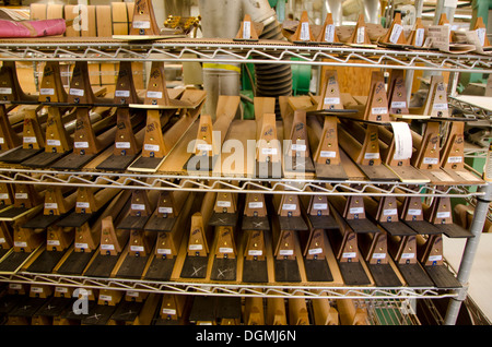 Stacked guitar necks during production process at Martin guitars factory  in Nazareth, Pennsylvania, USA Stock Photo
