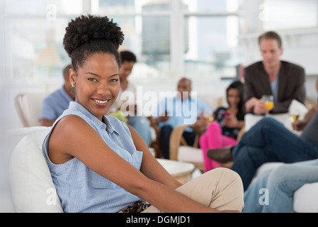 Office. A young woman smiling broadly. Stock Photo