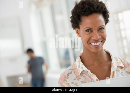Business people. A woman using a digital tablet. Stock Photo