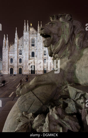 Lion sculpture on Piazza del Duomo, Cathedral Square, Milan Cathedral of Santa Maria Nascente in Milan, Piazza del Duomo, Milan Stock Photo