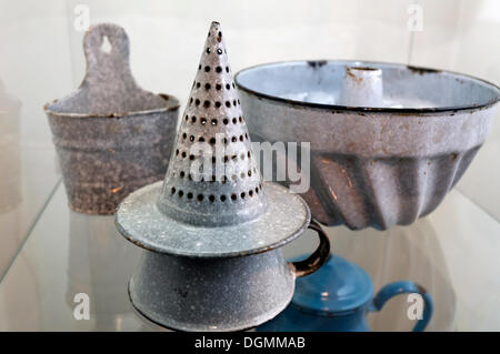 Funnel-shaped colander, cake pan, enamel products from the ironworks Thale, Huettenmuseum Thale ironworks museum, Thale, Harz Stock Photo