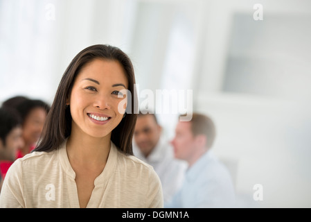 Business meeting. A group. A confident businesswoman. Leader. Stock Photo