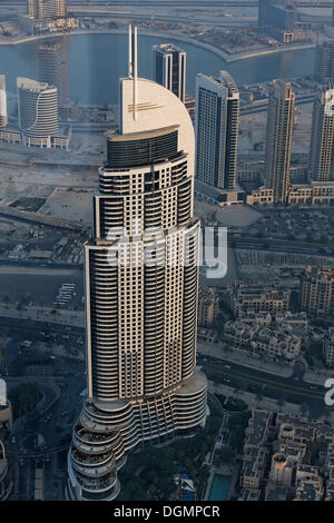 View from Burj Khalifa over a skyscraper, The Address, a luxury hotel and Fountain Lake, Dubai, United Arab Emirates Stock Photo