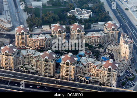 View from Burj Khalifa over a residential complex with luxury apartments and pool areas, Dubai, United Arab Emirates Stock Photo