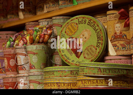 Shelf with retro design biscuit tins, La Cure Gourmande candy, 2nd Arrondissement, Paris, Ile-de-France, France Stock Photo