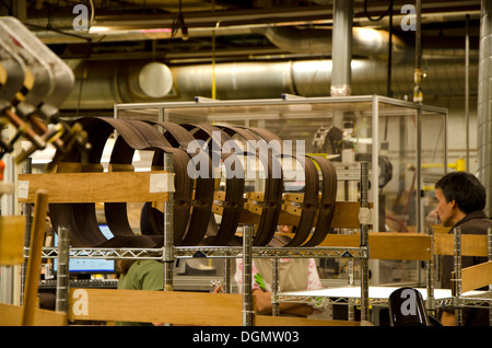 Row of guitar sides during production process at Martin guitars factory in Nazareth, Pennsylvania, USA Stock Photo
