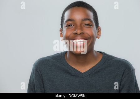 Portrait of teenage boy (14-15) smiling Stock Photo