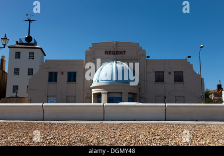 View of the art-deco  Regent Cinema, behind the new sea defences, Deal, kent. The timeball tower  is on the left. Stock Photo