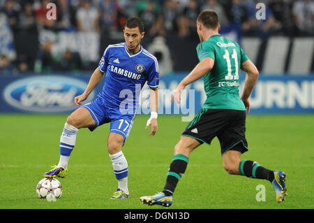 Gelsenkirchen, Germany. 22nd Oct, 2013. Chelsea's Eden Hazard plays the ball during the Champions League group E soccer match between FC Schalke 04 and FC Chelsea London at the Gelsenkirchen stadium in Gelsenkirchen, Germany, 22 October 2013. Photo: Frederic Scheidemann/dpa/Alamy Live News Stock Photo