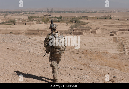 An U.S. Army soldier with Troop C, 6th Squadron, 8th Cavalry Regiment 'Mustangs,' 4th Infantry Brigade Combat Team, 3rd Infantry Division, descends a hill during an afternoon foot patrol near Forward Operating Base Shank, Logar province, Afghanistan, Oct.