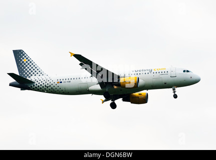 Vueling Airlines Airbus A320 Airliner on Approach for Landing at London Gatwick Airport West Sussex England United Kingdom UK Stock Photo