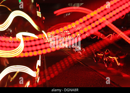 Speed of light Ruhr. Light event of 120 runners illuminated digital led lights on the runners suit. Art event of Angus Farquhar Stock Photo