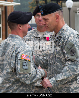 Senior leaders of Joint Base Lewis-McChord gathered at the 7th Infantry Division Headquarters, Oct. 15 to see a change of responsibility between outgoing command sergeant major, Del Byers and incoming command sergeant major, Samuel Murphy. Stock Photo