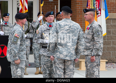 Senior leaders of Joint Base Lewis-McChord gathered at the 7th Infantry Division Headquarters, Oct. 15 to see a change of responsibility between outgoing command sergeant major, Del Byers and incoming command sergeant major, Samuel Murphy. Stock Photo