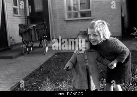 Historical 1950s image two little girls hi-res stock photography and images  - Alamy