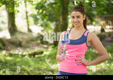 Cute Brunette Woman Wearing Sports Bra Standing City Park Outdoors Stock  Photo by ©platinumArt 575838432