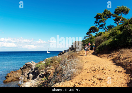 Europe, France, Alpes-Maritimes, 06, Antibes, Le Cap, hiker on the trail. Stock Photo