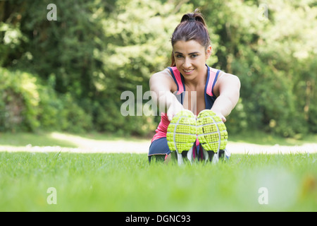 Pretty sporty woman stretching Stock Photo