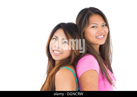 Two asian girls posing for the camera Stock Photo