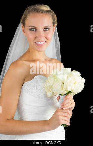 Lovely bride posing smiling at camera Stock Photo