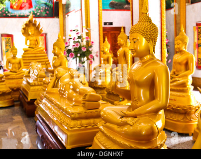 Buddhas inside the Wat Chalong temple, Phuket, Thailand. Stock Photo