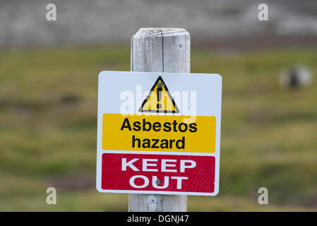 Warning sign 'Asbestos hazard - keep out' at the Stromness whaling station, Stromness Bay, South Georgia and the South Sandwich Stock Photo