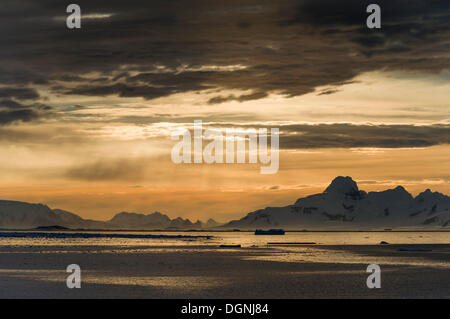 Sunset mood over a fjord, Buttler Passage, Danco Coast, Antarctic Peninsula, Antarctica Stock Photo